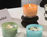 Candles with minerals, precious stones.