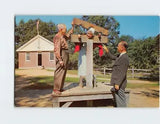 Postcard Village Hostess in Pillory Old Sturbridge Village Massachusetts USA