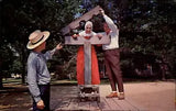 Massachusetts Sturbridge Old Village hostess locked in pillory ~ postcard sku337